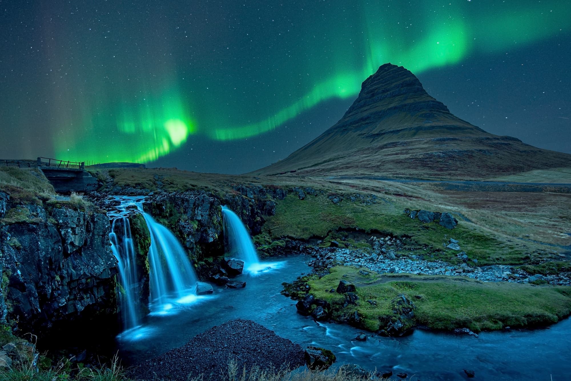 Northern lights over Kirkjufell at night in the autumn of Iceland.