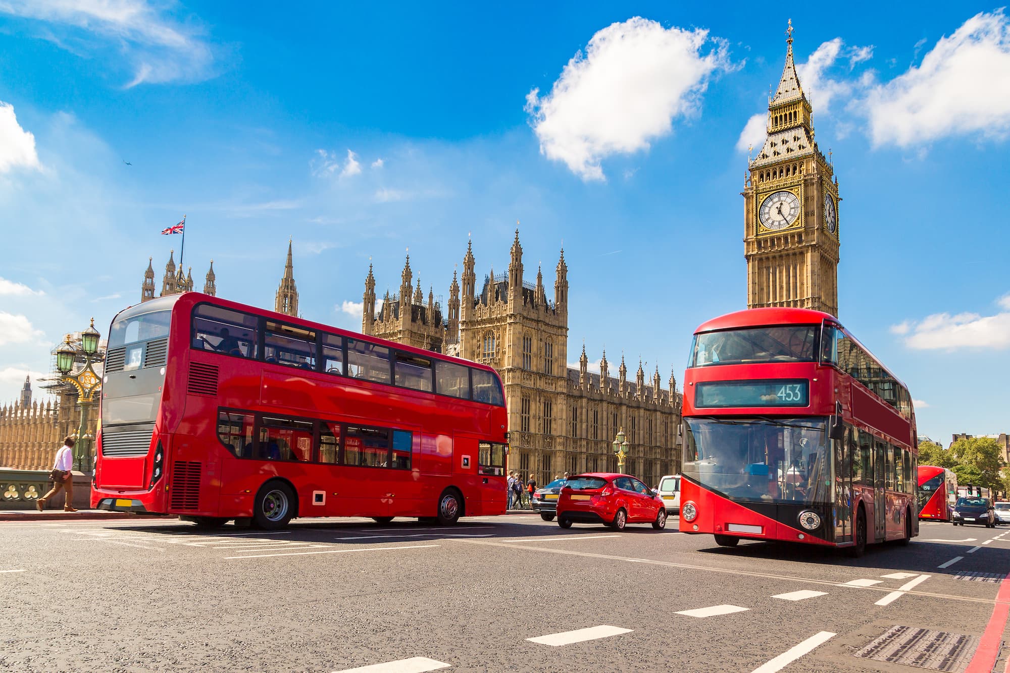Big Ben, Westminster Bridge and red double decker bus in London, England, United Kingdom